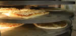 Pizzas in Rotating Oven